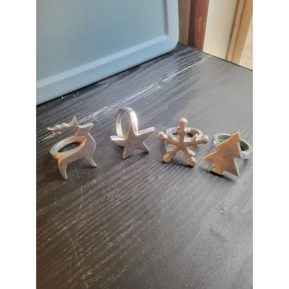 Silver Metal Christmas Napkin Rings Set of 4 Reindeer Star Snowflake Tree